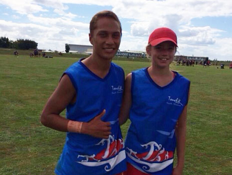 Kiani Tahere, right, is taking her rugby skills to the next level of competition.