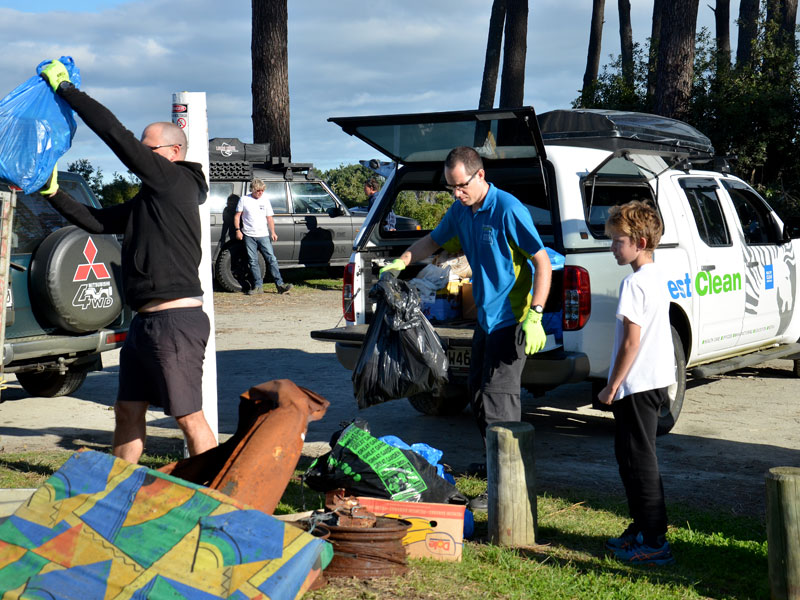 Dominik Drahoninsky with other volunteers at Muriwai Beach.