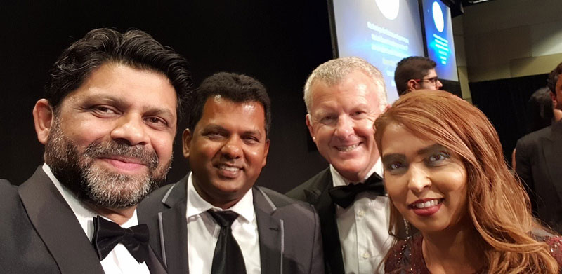 Fiji’s Deputy Prime Minister and Attorney General Aiyaz Sayed-Khaiyum (left) congratulates Viky and Nileshna Narayan. Looking on is Grant McLauchlan, CrestClean’s Managing Director.