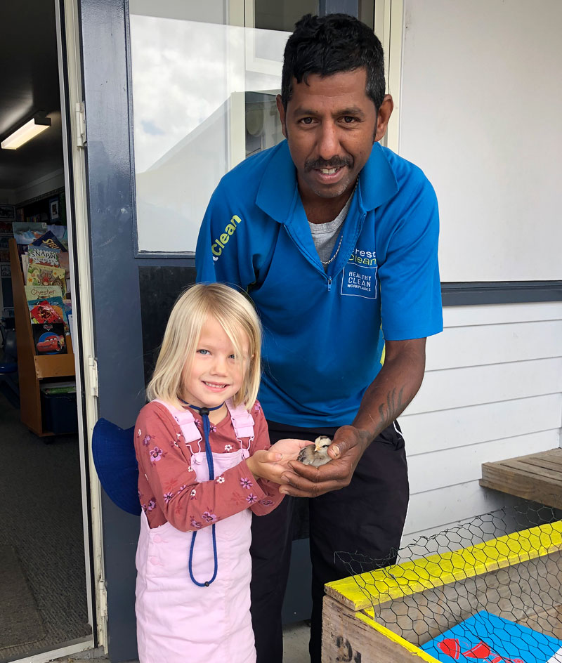 Piper Gillingham gets to hold a chick.