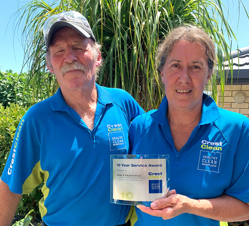 Stuart and Raylene Price with their long service award from CrestClean.