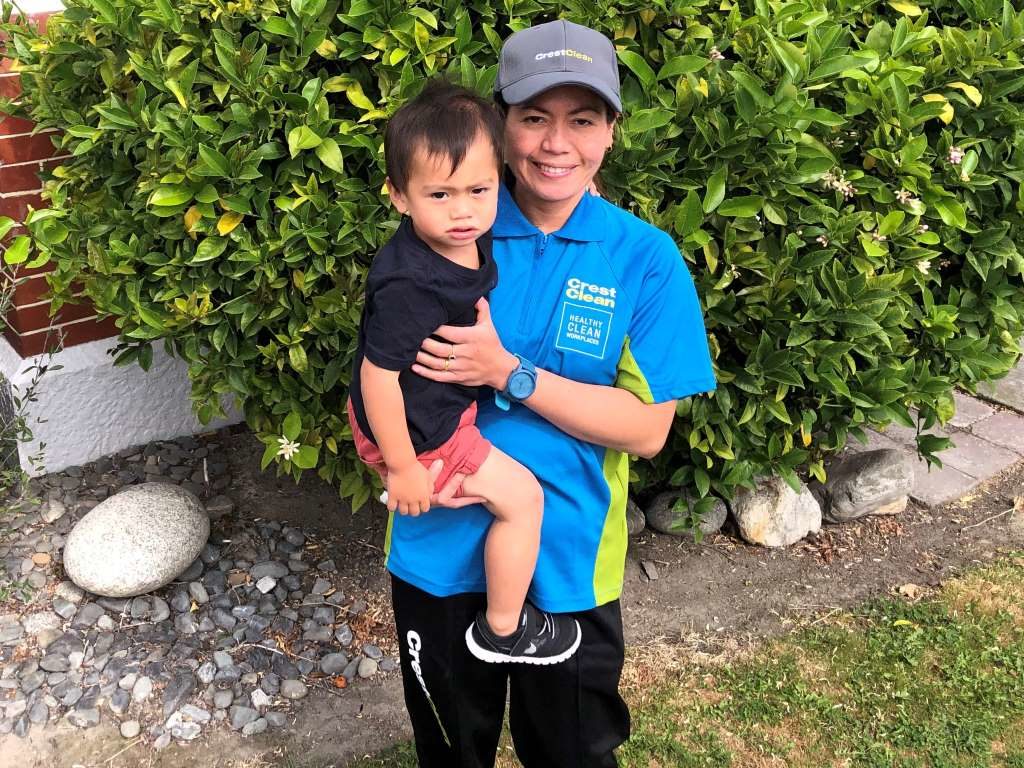 Cleaner spends time with her 18-month-old son.