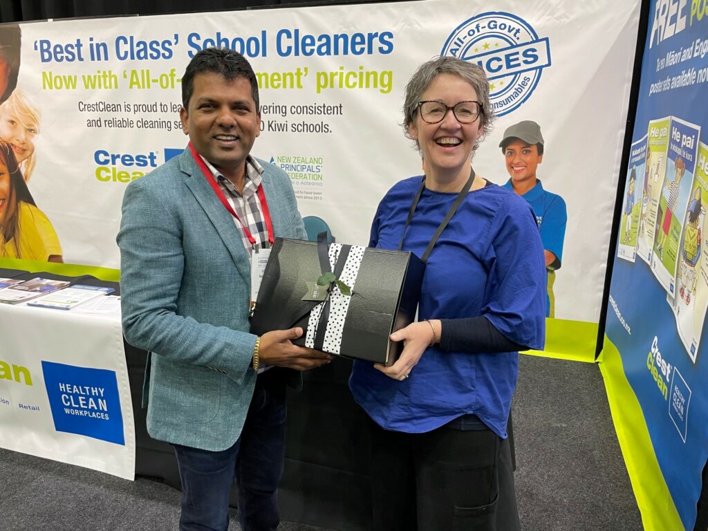 Gift hamper winning receiving prize.
