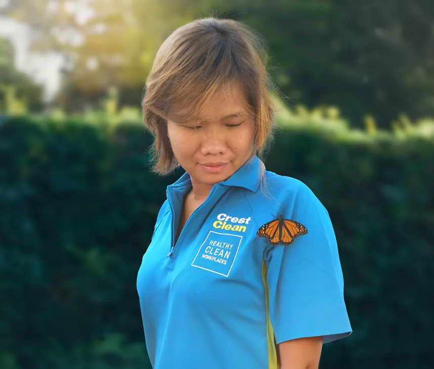 Setting the standard environmental - cleaner with monarch butterfly on shoulder